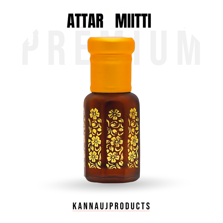 Mitti attar bottle with yellow cap and floral gold design showcasing natural attar oil from Kannauj