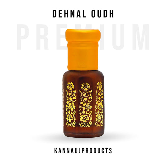 Dehnul Oudh attar in brown glass bottle with yellow cap and gold floral design by Kannauj Products