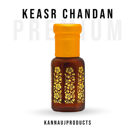 Kesar Chandan attar bottle by Kannauj Products with floral gold design and orange cap