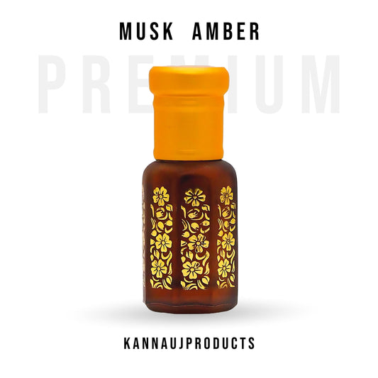 Kannauj Products musk amber attar bottle with floral design and orange cap on white background