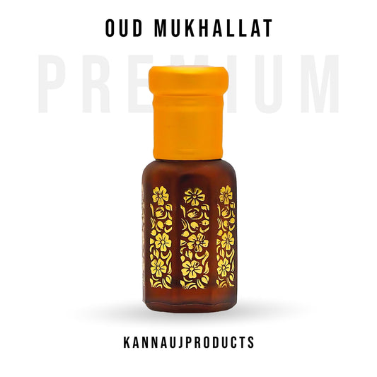 Kannauj Products oud mukhallat attar in brown glass bottle with yellow cap and gold floral design