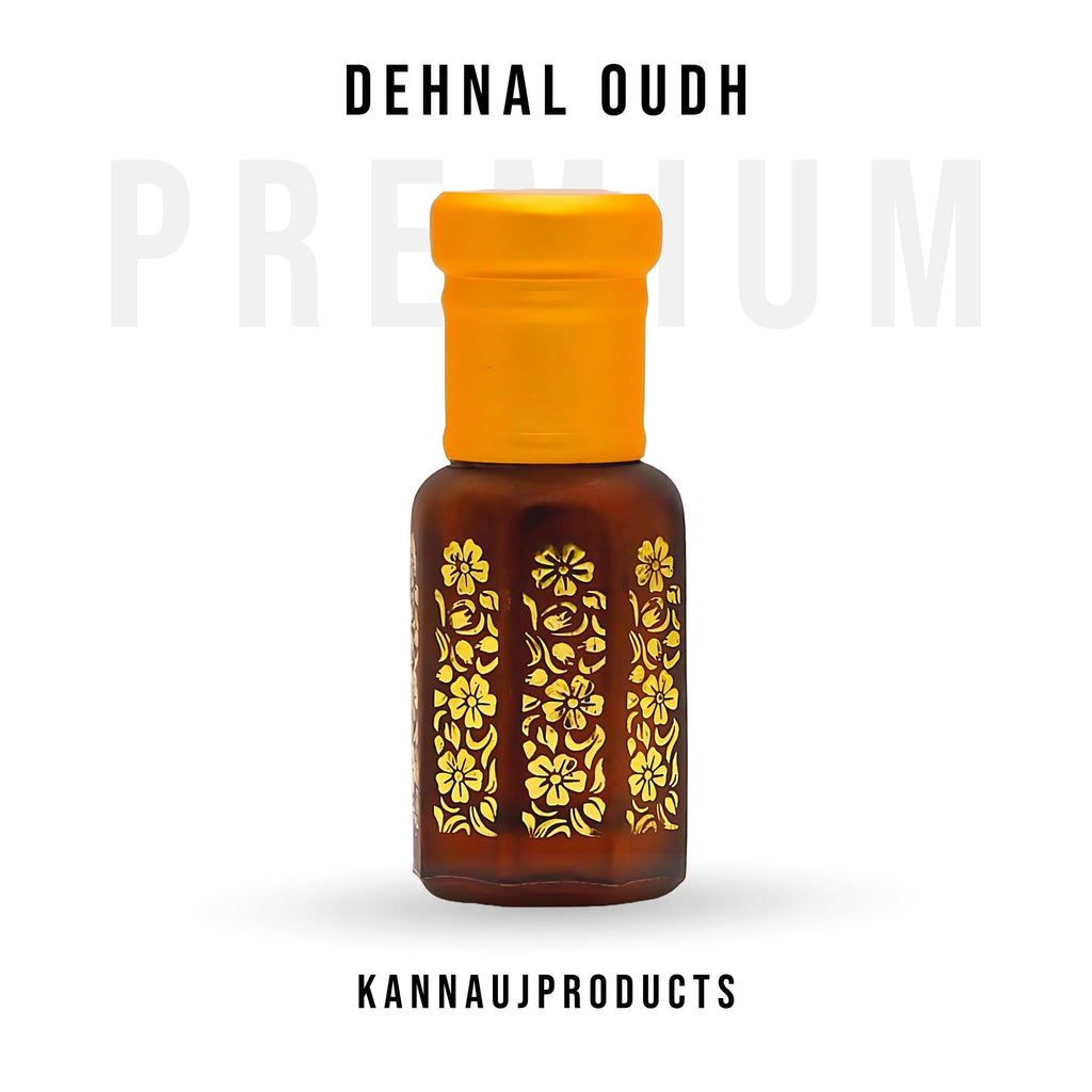 Dehnul Oudh attar in brown glass bottle with yellow cap and gold floral design by Kannauj Products