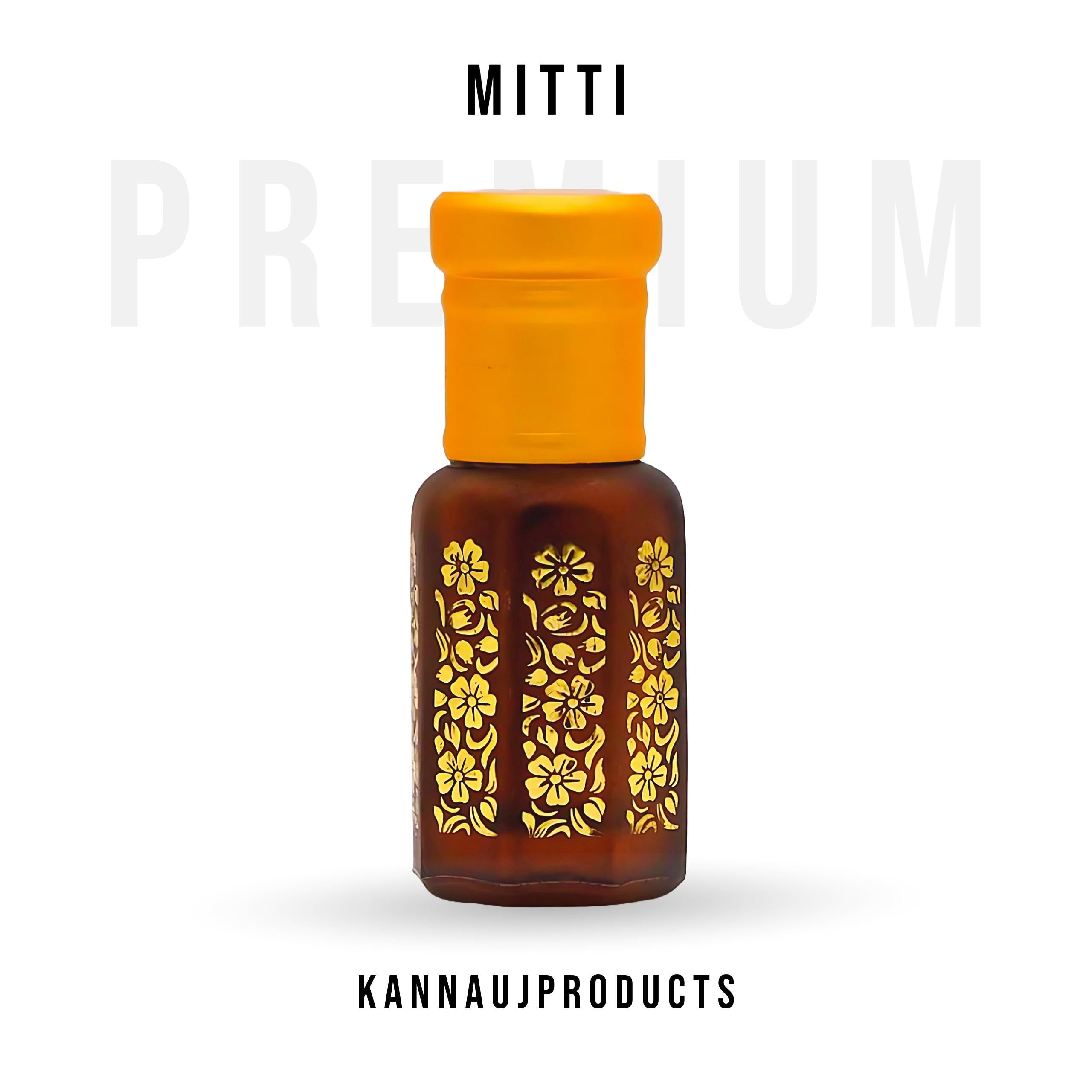 Luxury attar combo set Mitti amber glass bottle with yellow cap and gold floral design by Kannauj Products