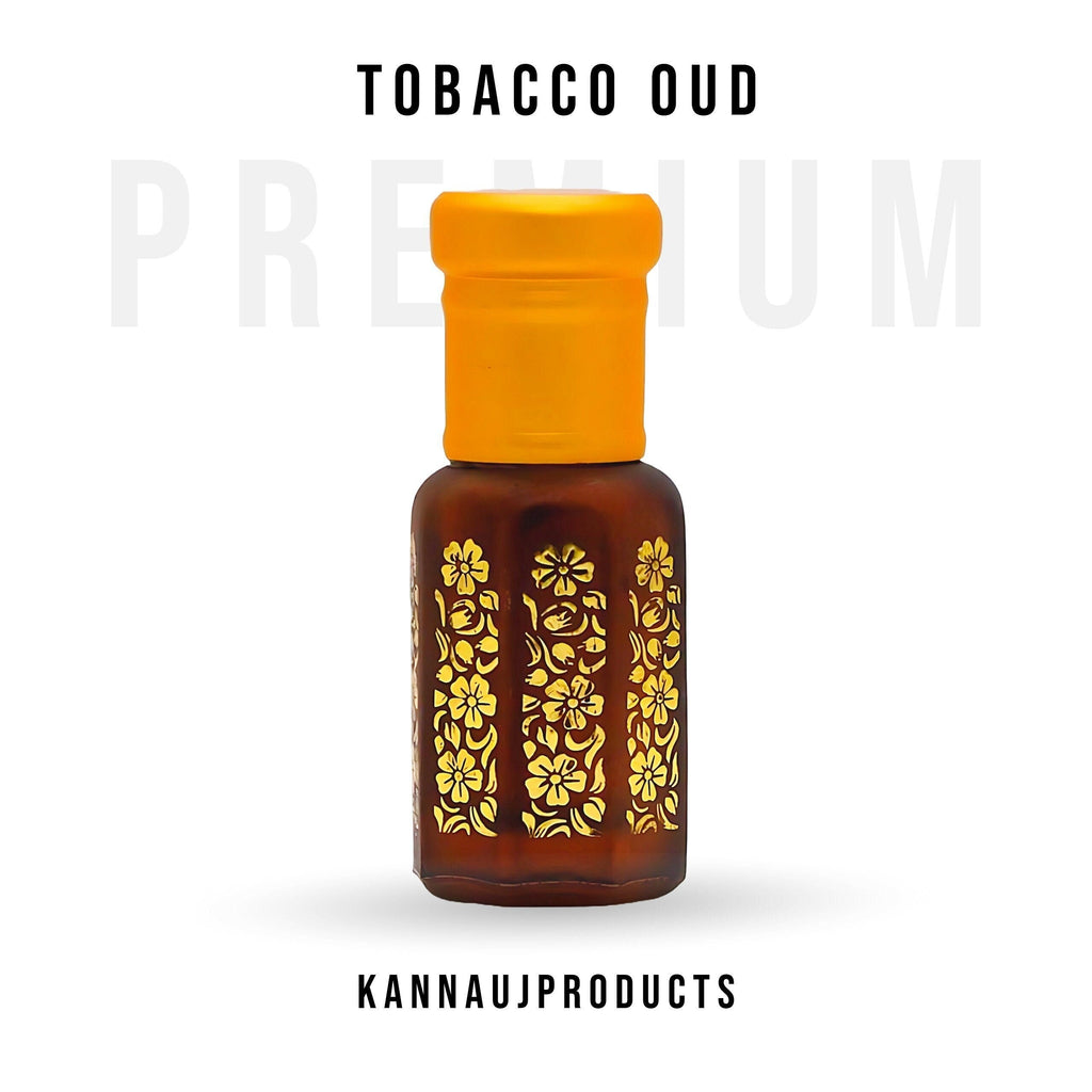 Kannauj Products tobacco oudh attar perfume amber glass bottle with yellow cap and gold floral design