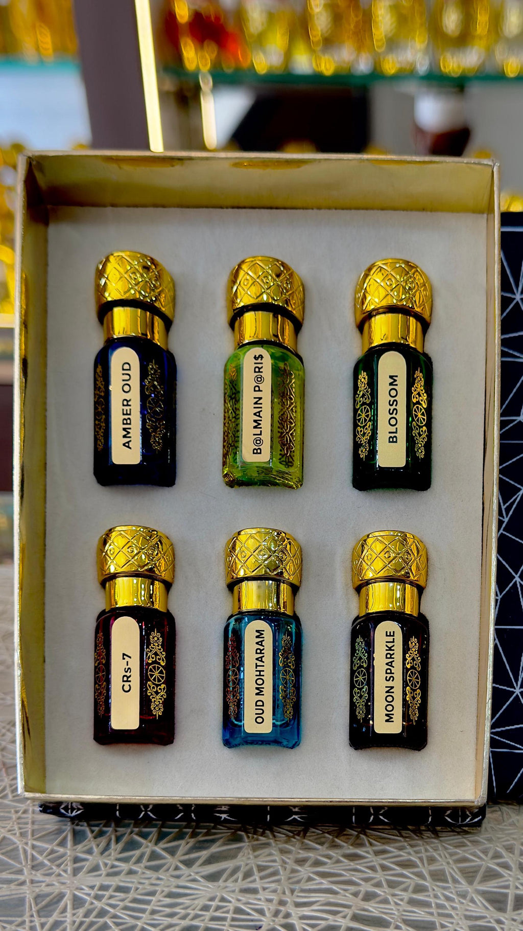 Kannauj Products attar gift pack six ornate glass perfume bottles with gold caps in presentation box